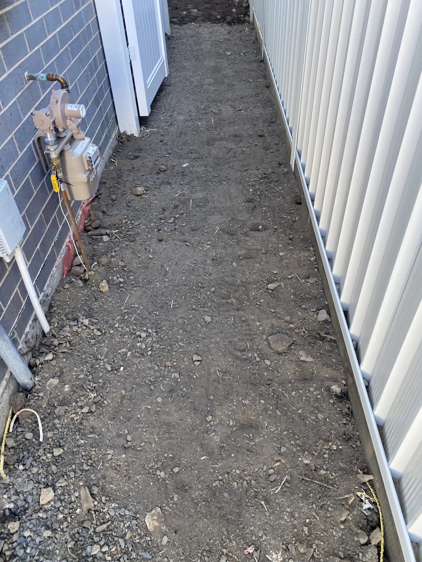 Side access excavated — Base course down