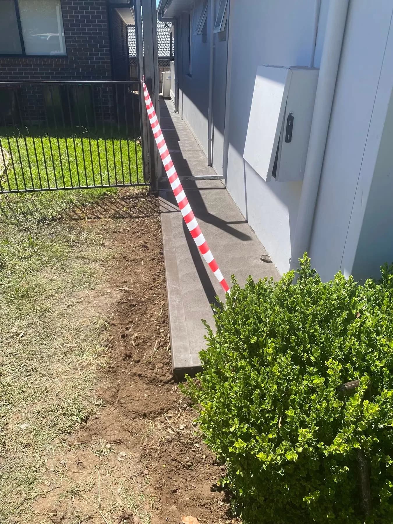 Path beside the house — Completed, taped off to cure